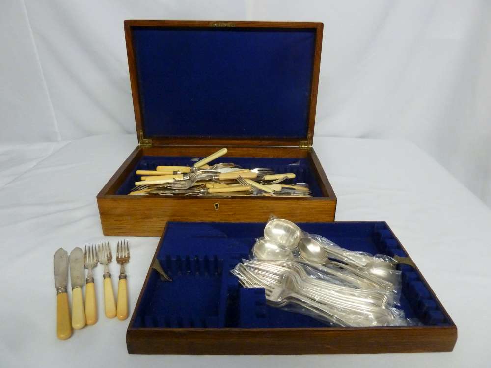 A quantity of silver plated flatware to include bone handled knives and forks