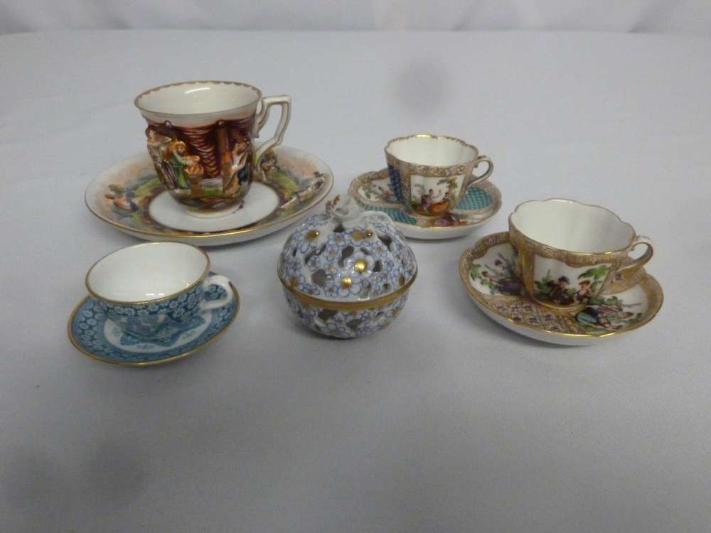 A quantity of porcelain to include four cabinet cups and saucers, and a Herend covered dish