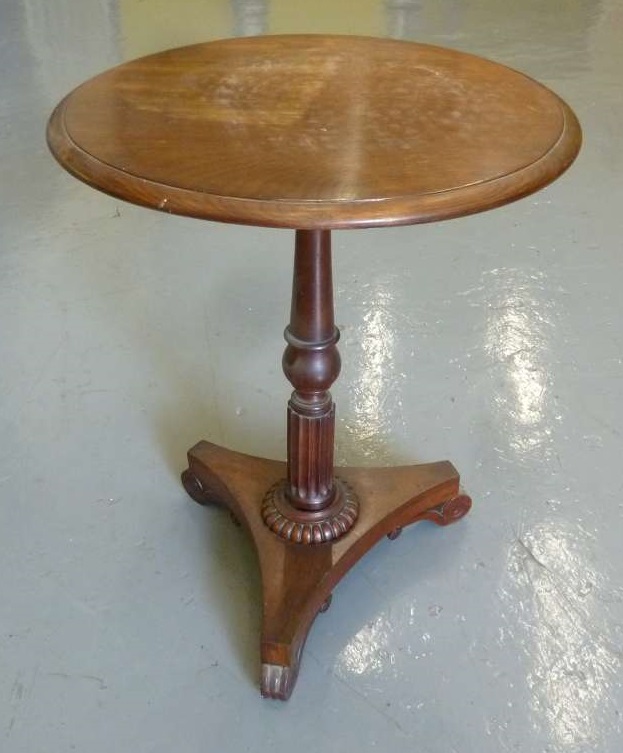 Circular mahogany side table on pedestal base