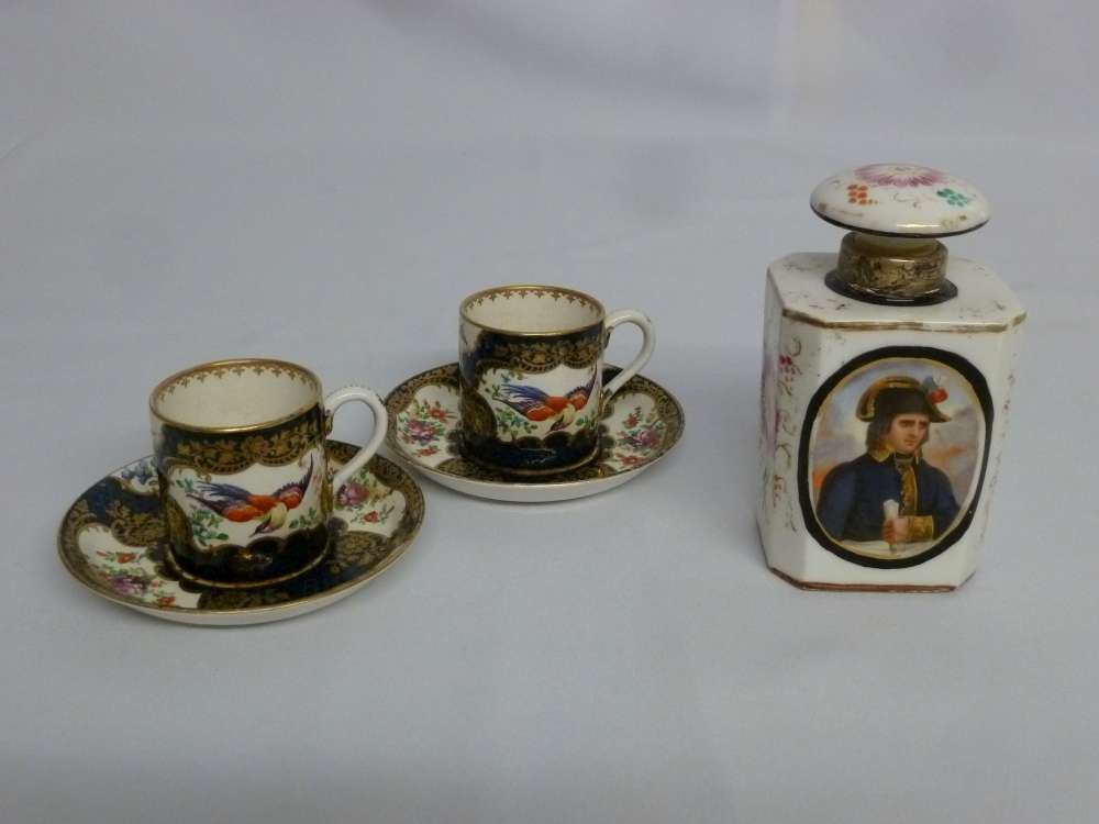 Napoleon perfume bottle with silver collar and pair of Worcester style cups and saucers