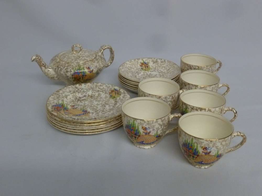 An Empire tea set to include teapot, six plates and six cups and saucers