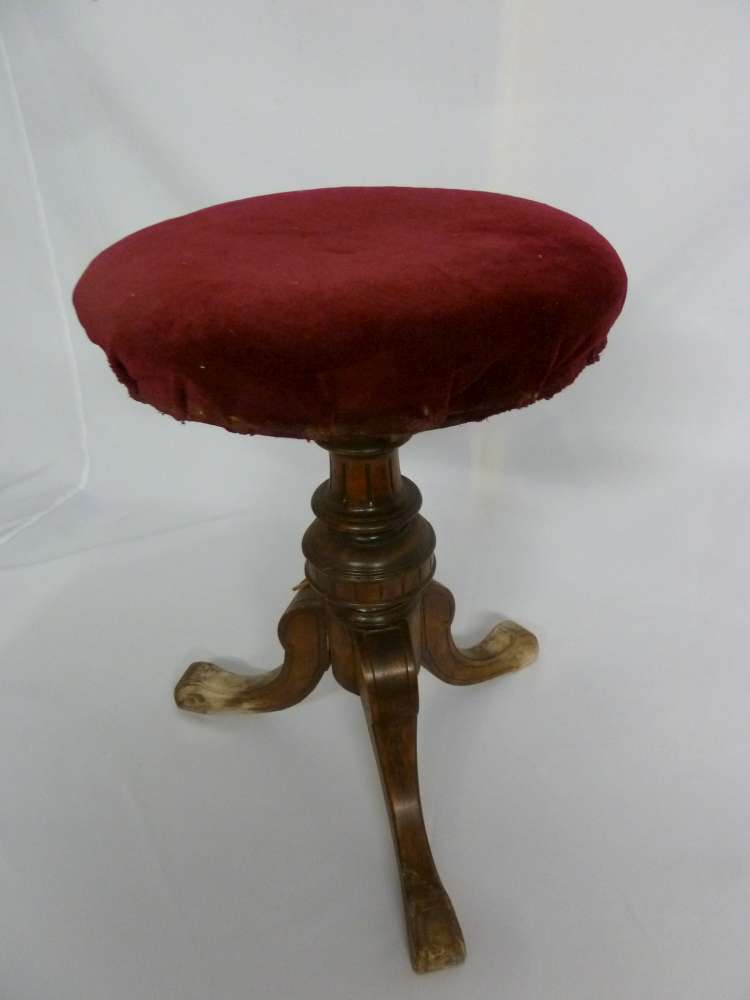 Victorian mahogany piano stool on three scrolling legs