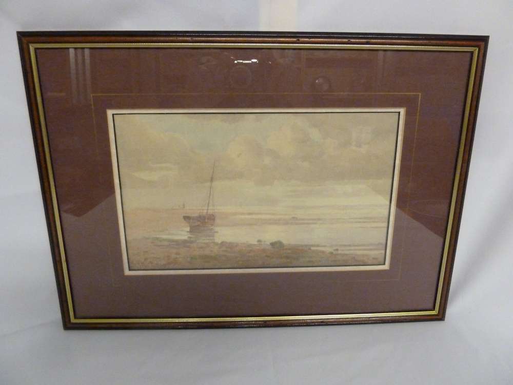 A framed watercolour of a seaside scene, signed bottom left - 20 x 24cm