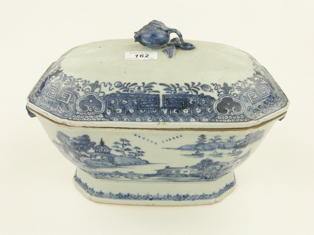 A Chinese blue and white tureen with painted landscapes and animal head handles, and cover, length