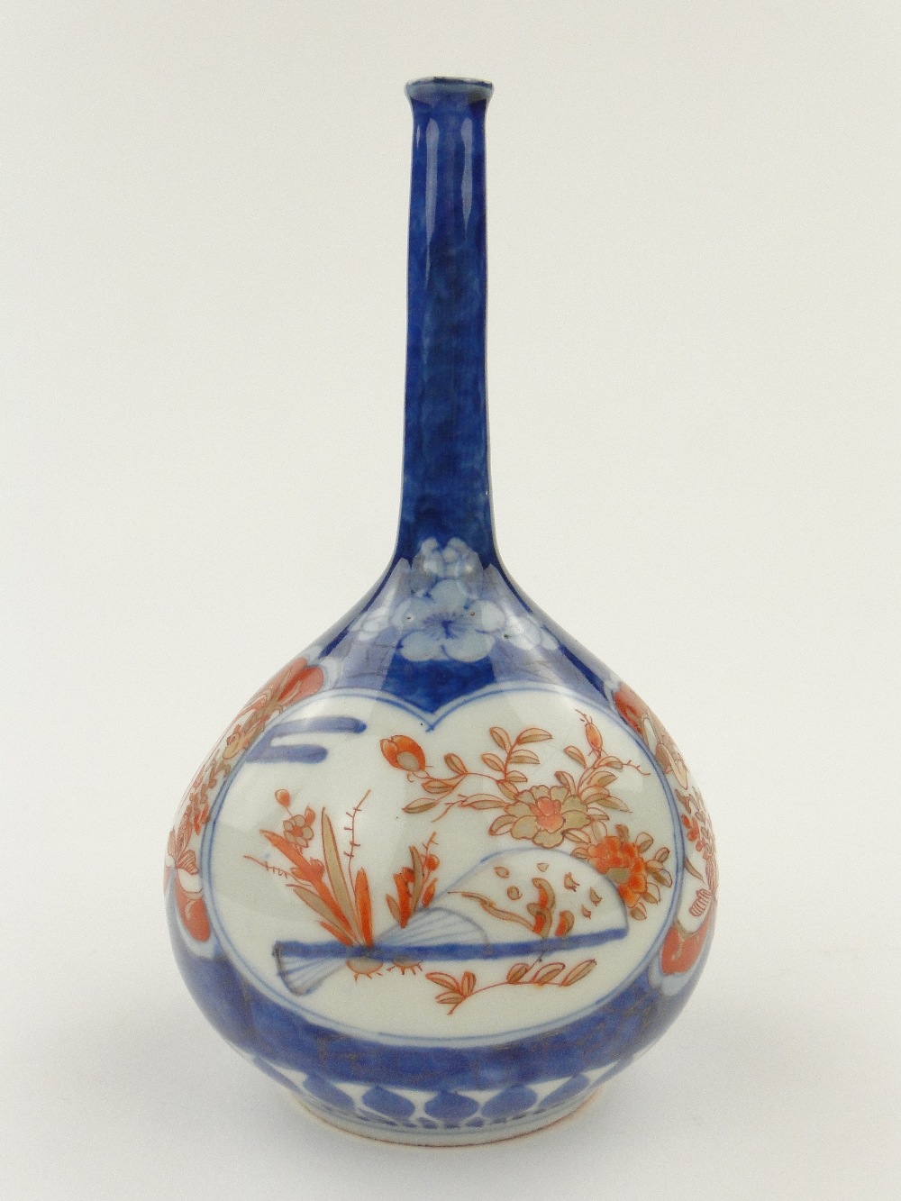 WITHDRAWN
A Japanese bottle vase with painted and gilded floral and bird design panels, 6.25".