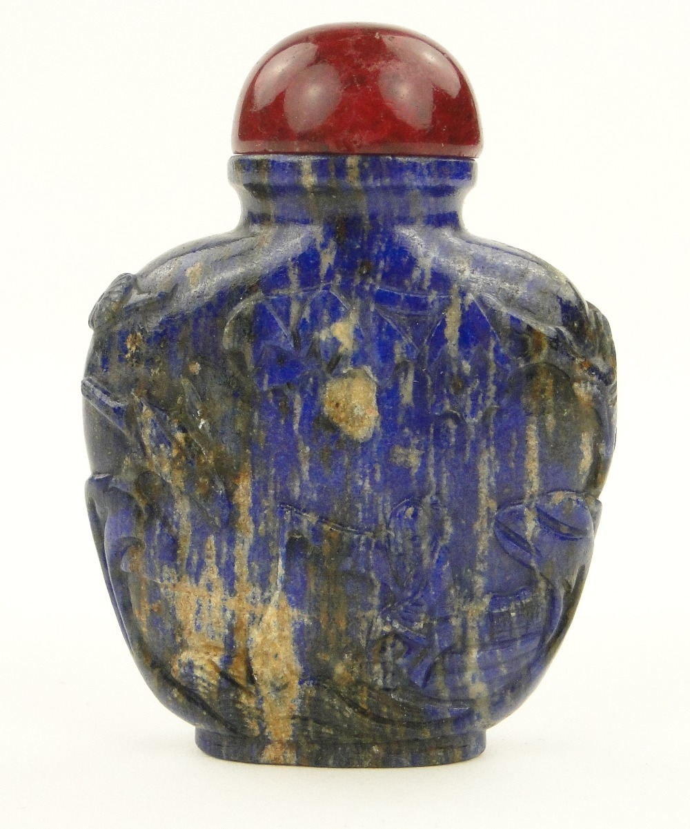 Antique Chinese relief-carved lapis snuff bottle with designs depicting a fisherman and birds