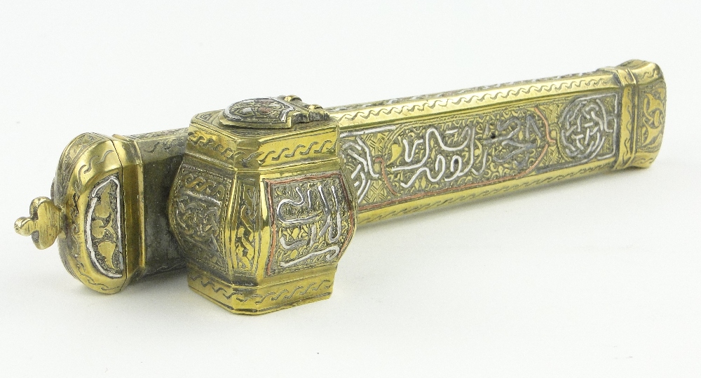 A Middle Eastern scribes brass, copper and silver inlaid pen and ink case, length 8.5".