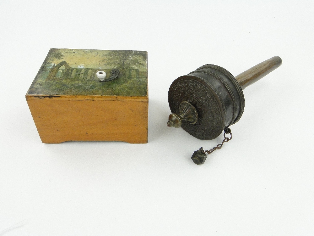 A French musical box with design of a church ruin to the lid, length 5.5" and an Eastern prayer