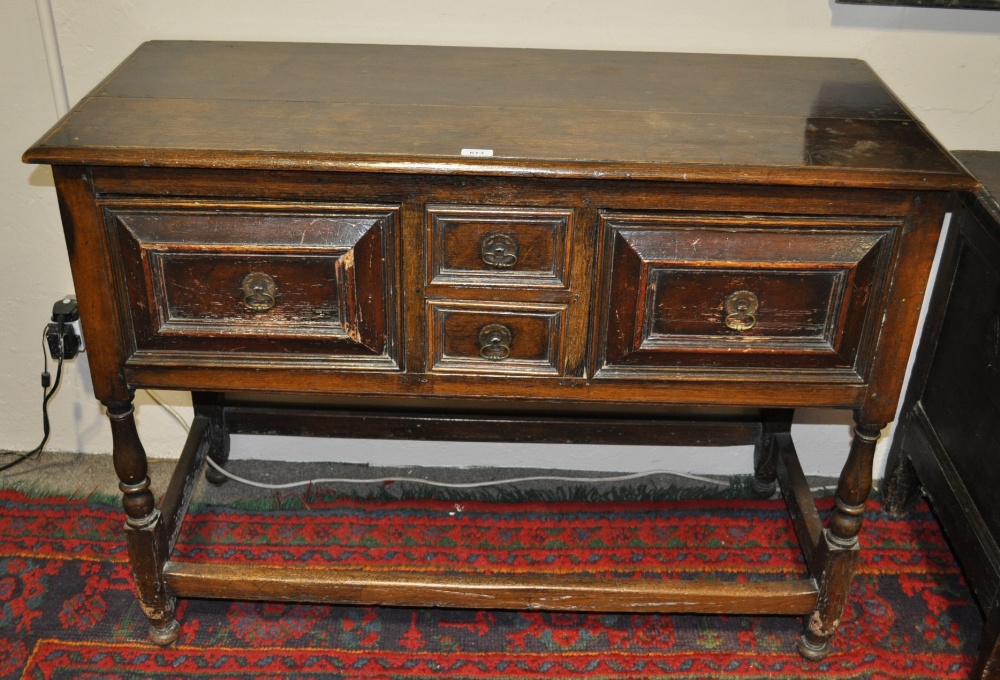 An Antique oak dresser base with 4 short drawers and turned baluster legs, width 46".