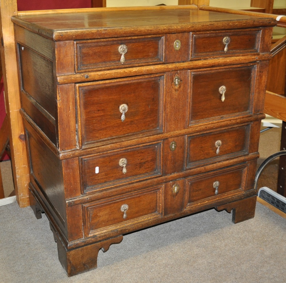 18th century oak 2-section chest with 4 long drawers with moulded fronts, on bracket feet, width