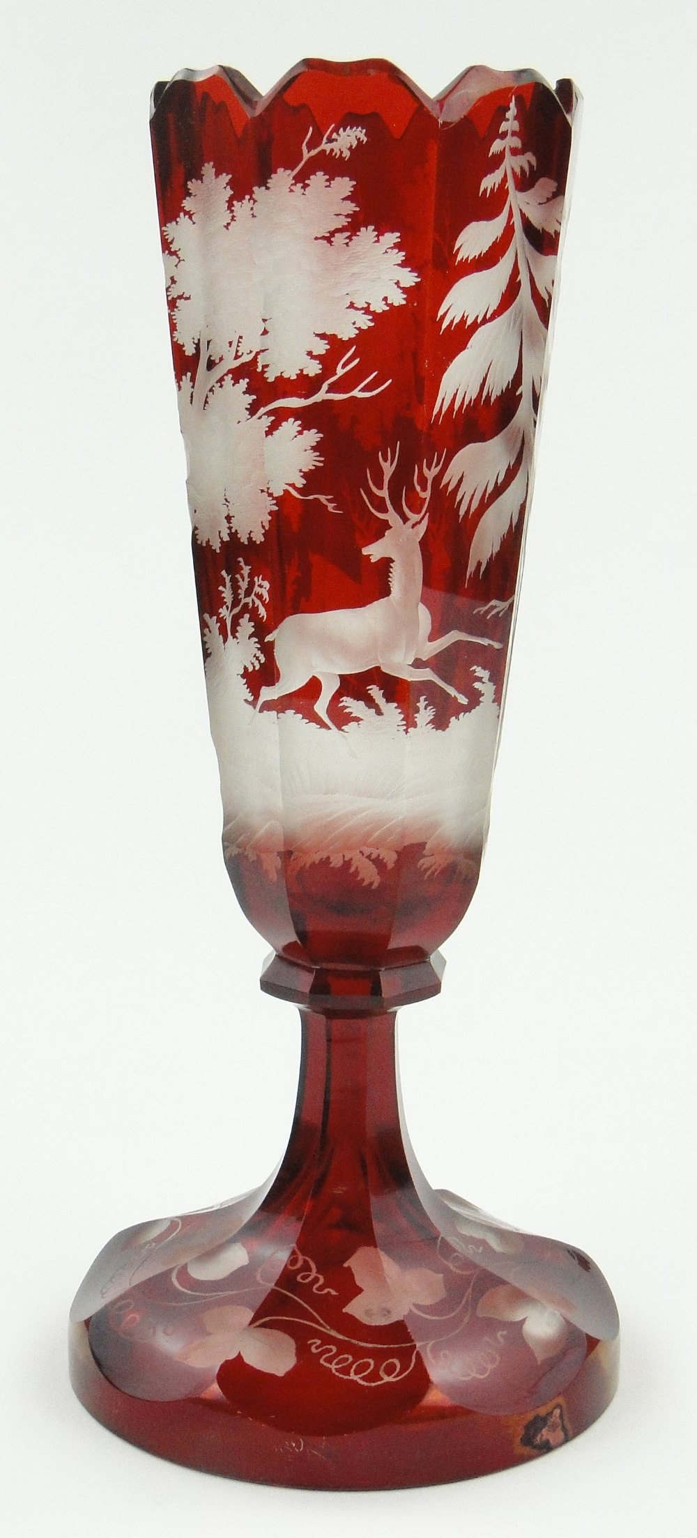 Antique overlay cut-glass vase with design of deer in a wood, 12".