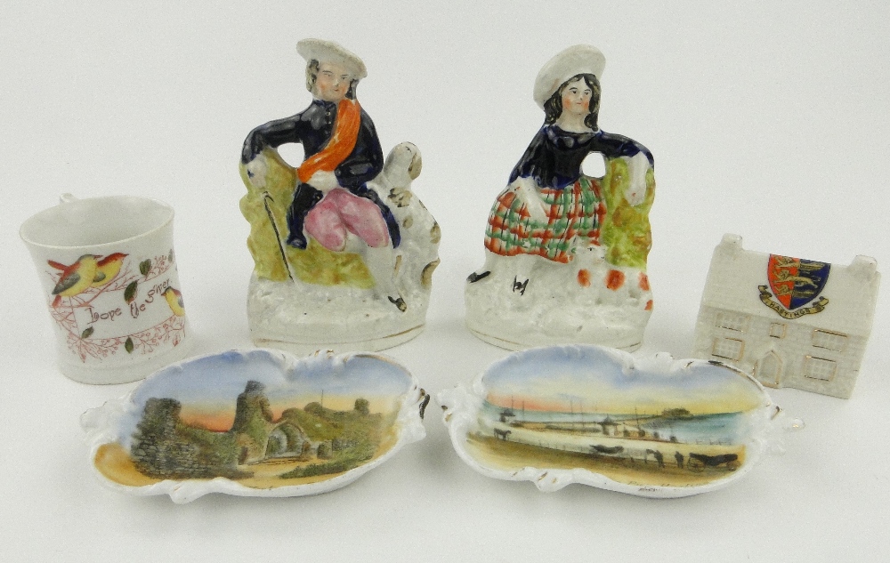 A pair of Victorian Staffordshire figures, 6", Hastings souvenir dishes and cottage and a