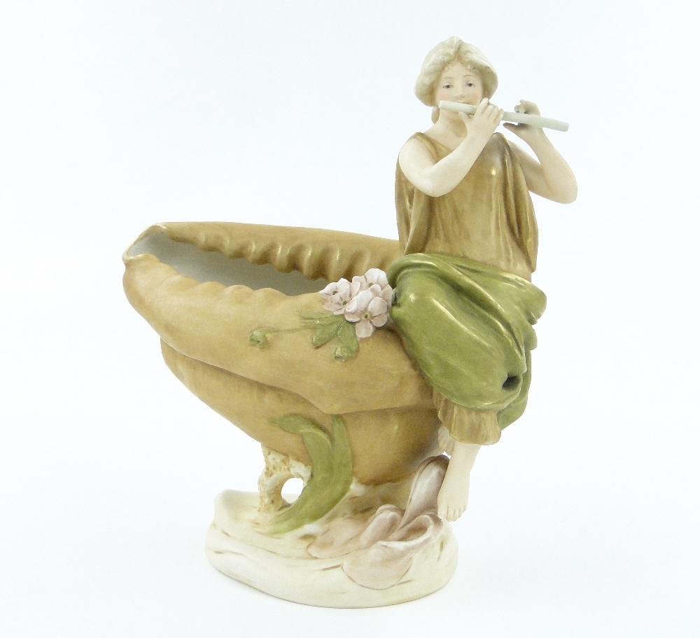 Royal Dux vase modelled as a shell, with a lady playing the flute, height 10.75".