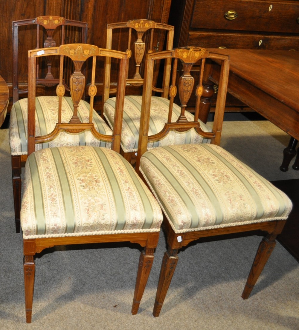 Set of Edwardian rosewood dining chairs having marquetry decoration and upholstered seats on