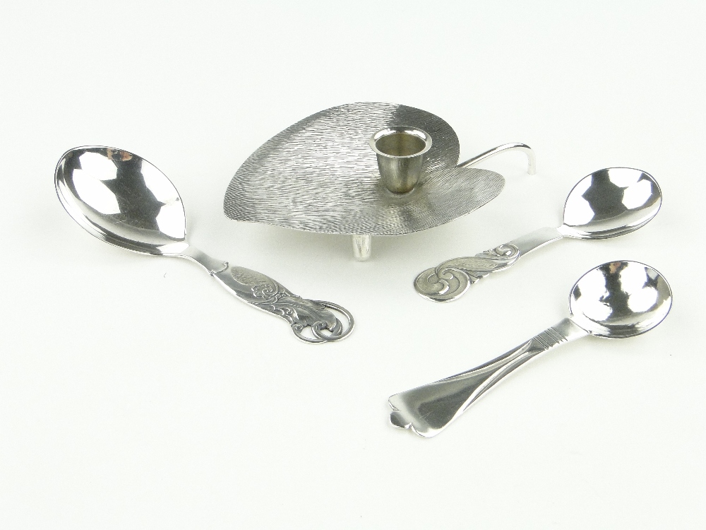 3 Danish silver spoons together with a Continental stylised chamberstick.