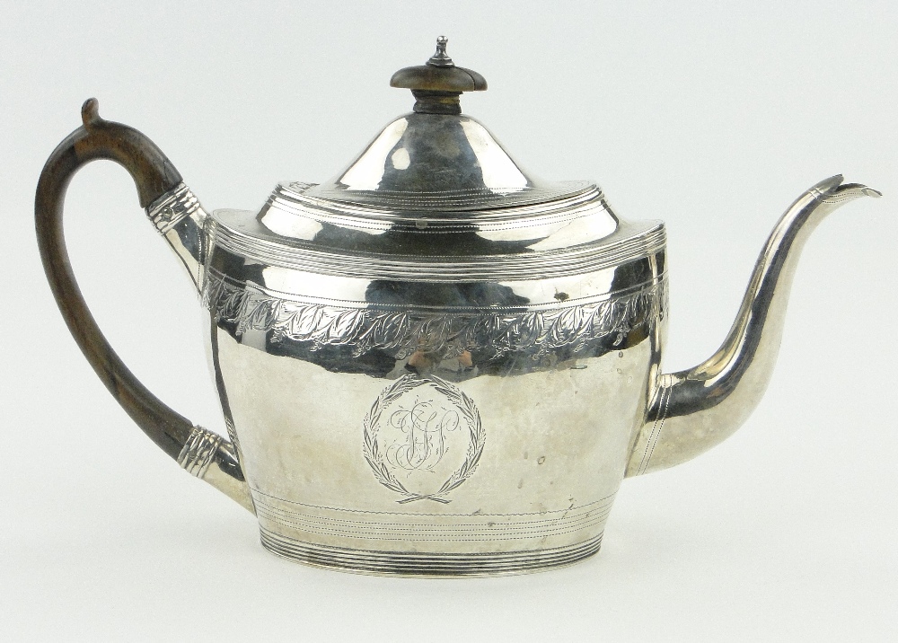 George III silver teapot of bulbous oval form with engraved floral bands, makers marks GB London