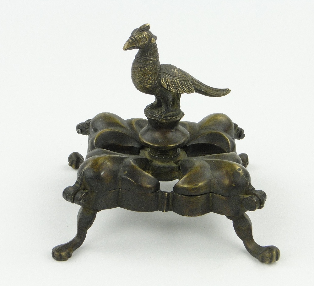 An Eastern spice container comprising 4 lidded boxes with central bird knop, length 5.25".