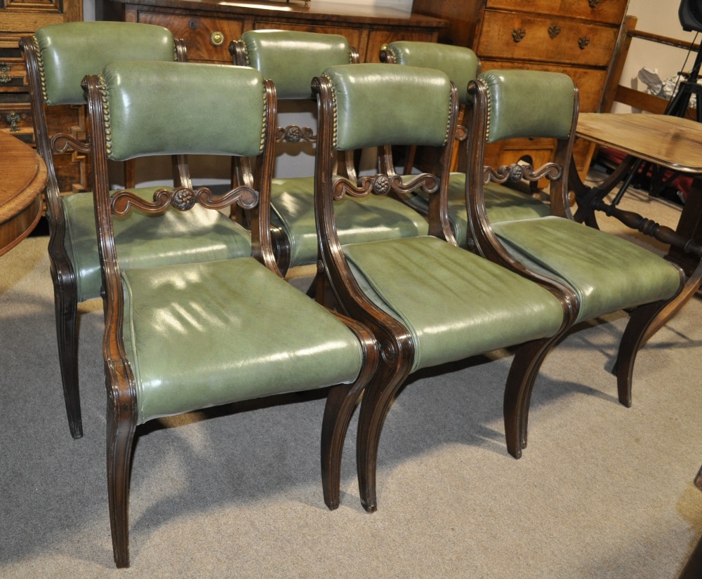 A set of 6 19th century American Federal mahogany dining chairs, having studded green leather