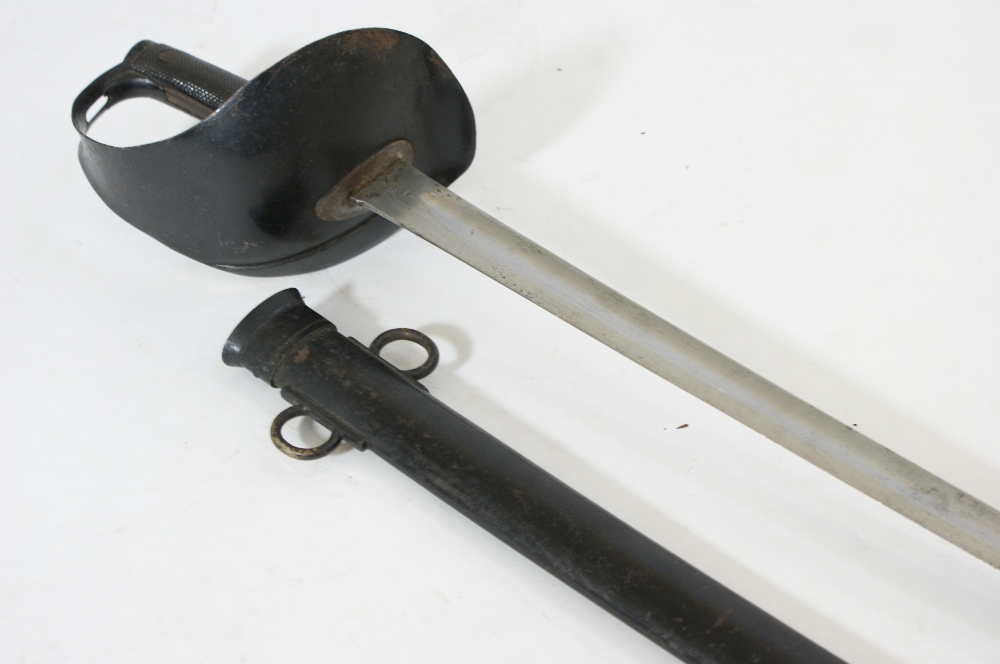 British cavalry sword and scabbard, circa 1900-10, 84.5cm blade, full finger guard, chequered grip
