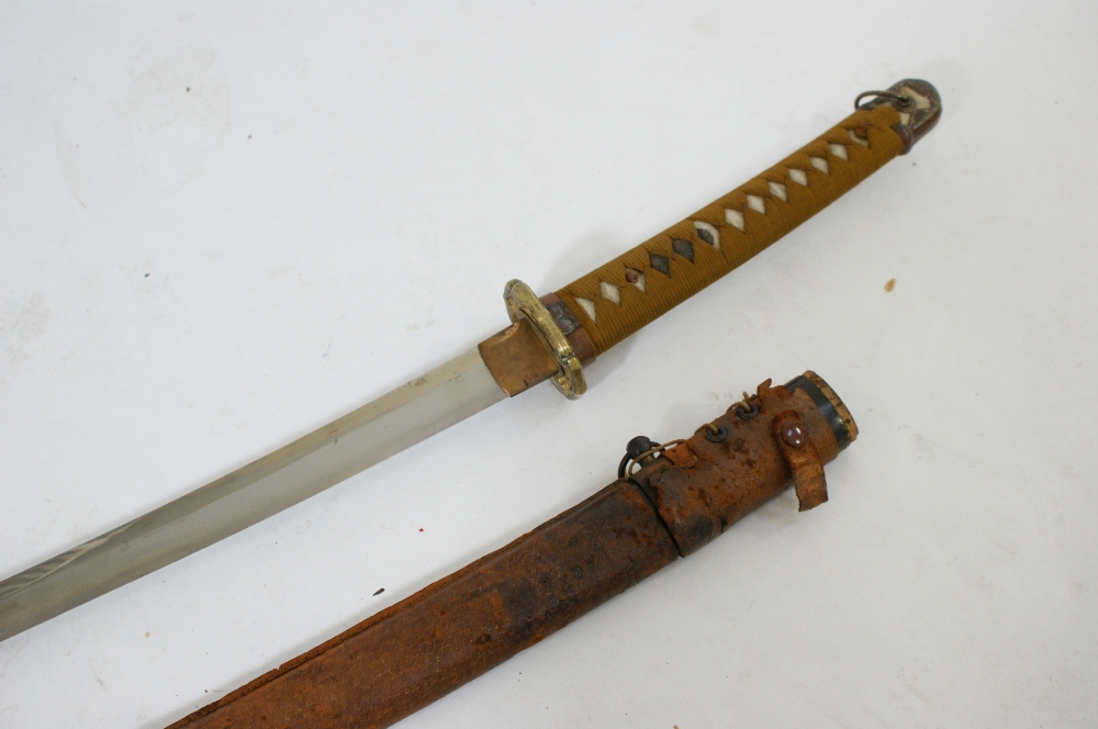 Second World War Japanese Katana, 66cm blade, cast brass tsuba, shagreen and olive fabric hilt,