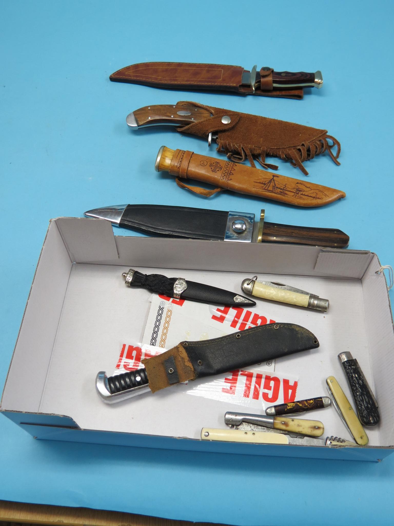 Five various daggers, each within sheath, replica Sgian Dubh and various folding fruit/pen-knives