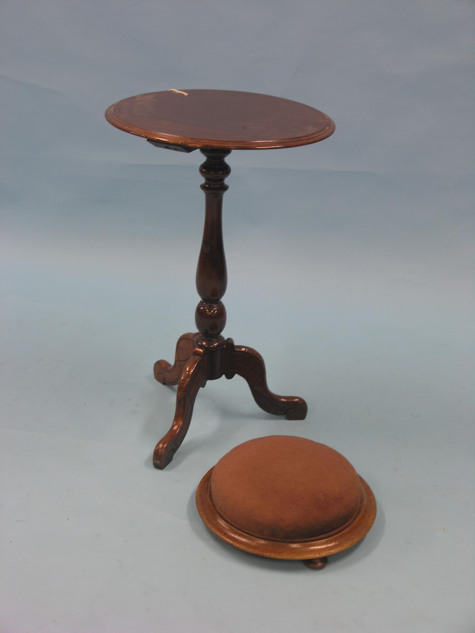 A Victorian mahogany tripod table, with circular top, top 1ft. 6in., together with a Victorian