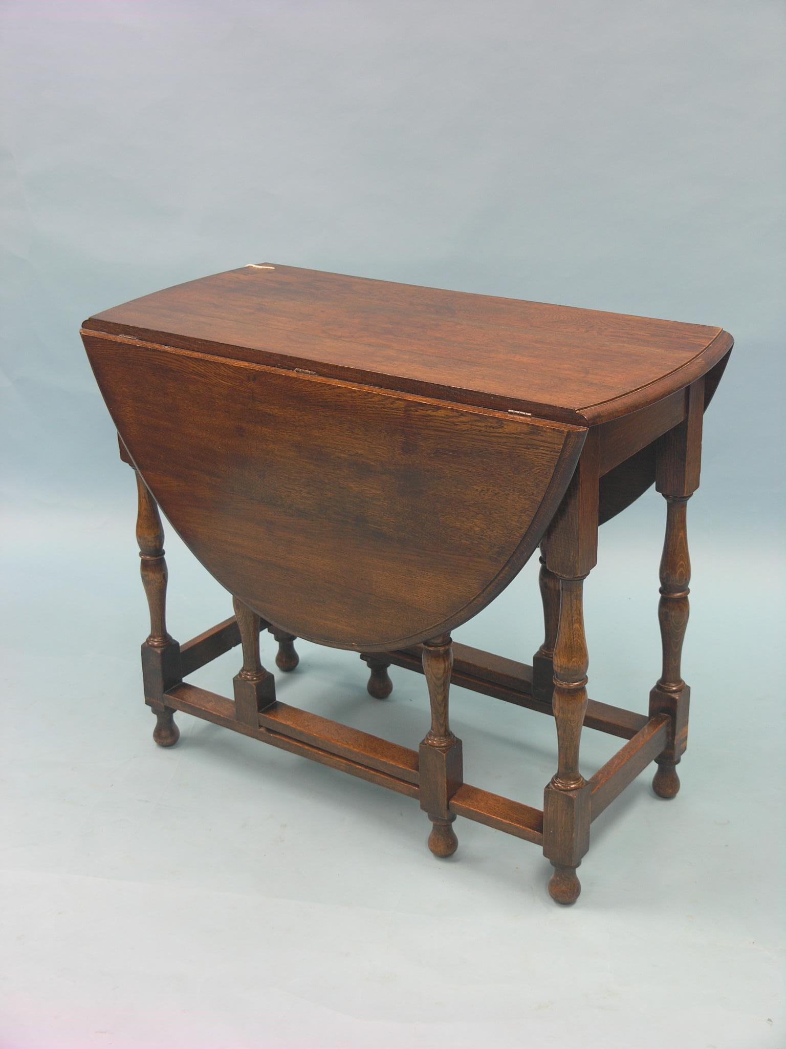 An oak gateleg table, on baluster-turned underframe, 2ft. 11in.