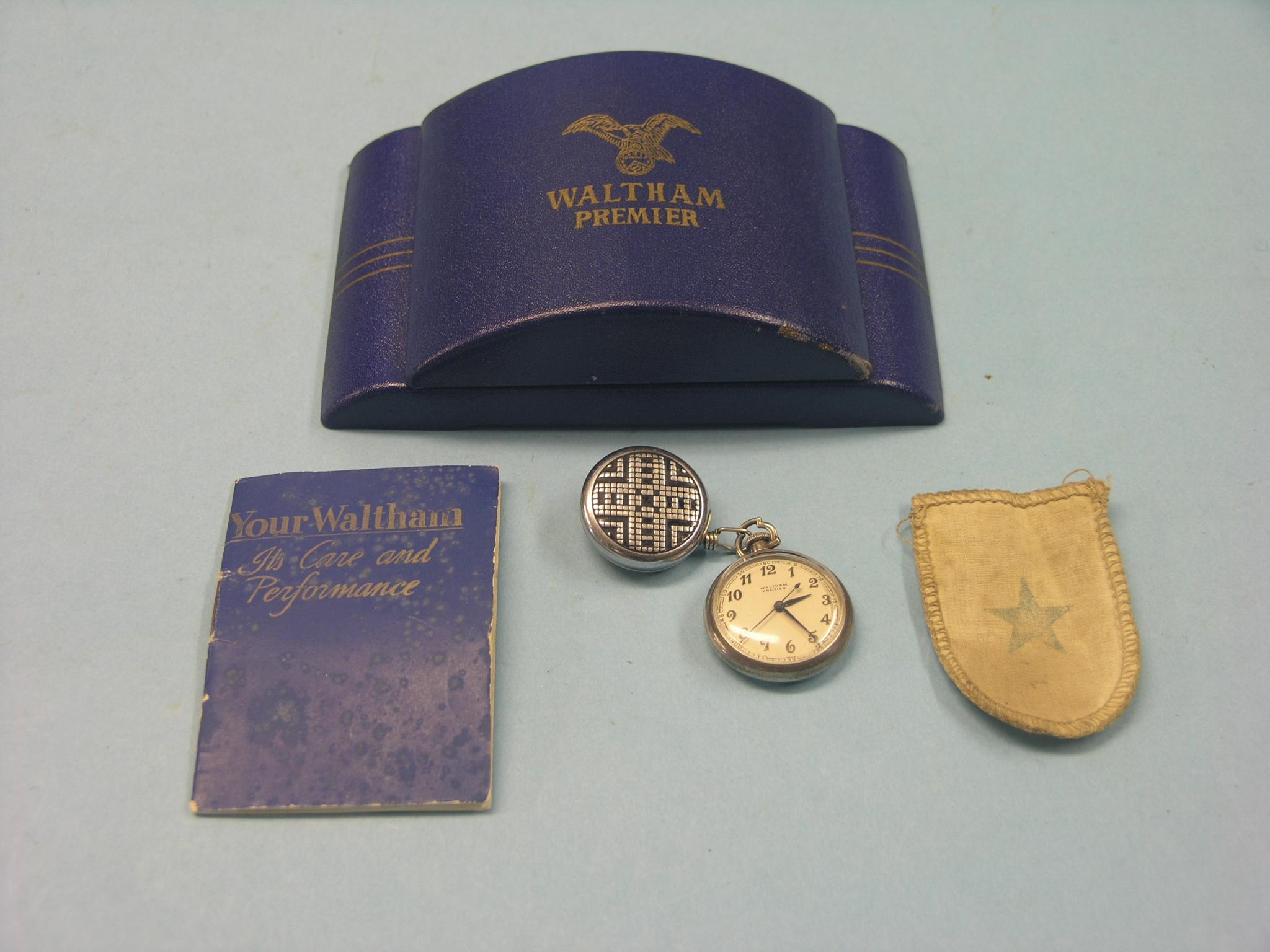 A Waltham Premier lady`s watch, pendant form, within original case, complete with linen pocket and