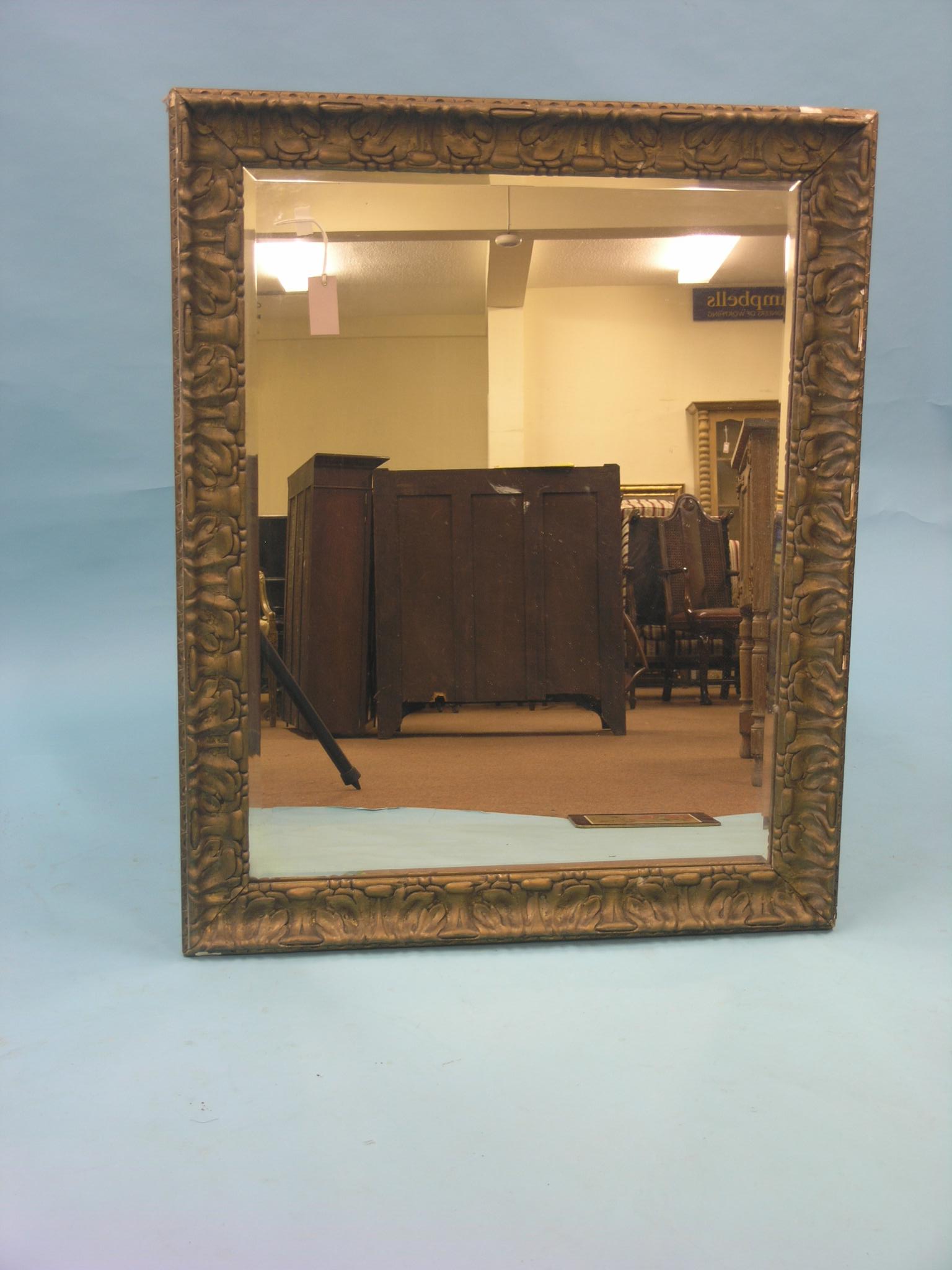 A large Victorian bevelled mirror, rectangular-shape with moulded gilt frame, 2ft. 10in. x 3ft. 6in.