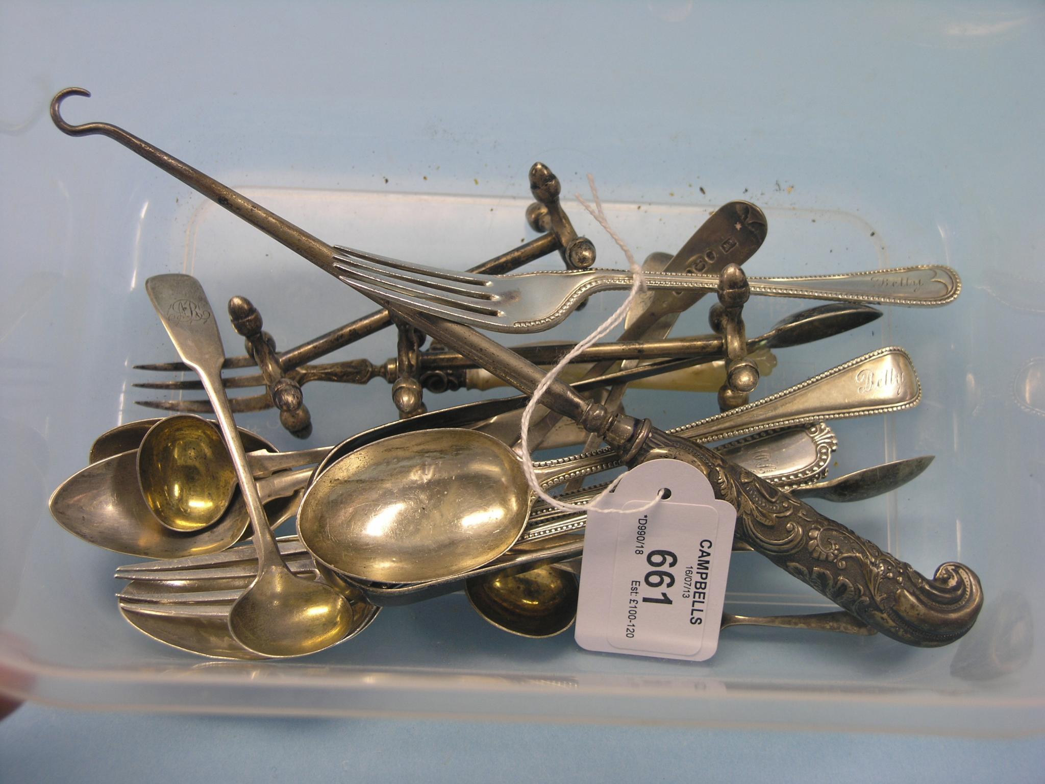 A pair of silver knife-rests, with acorn finials, pair of silver sugar tongs and a small