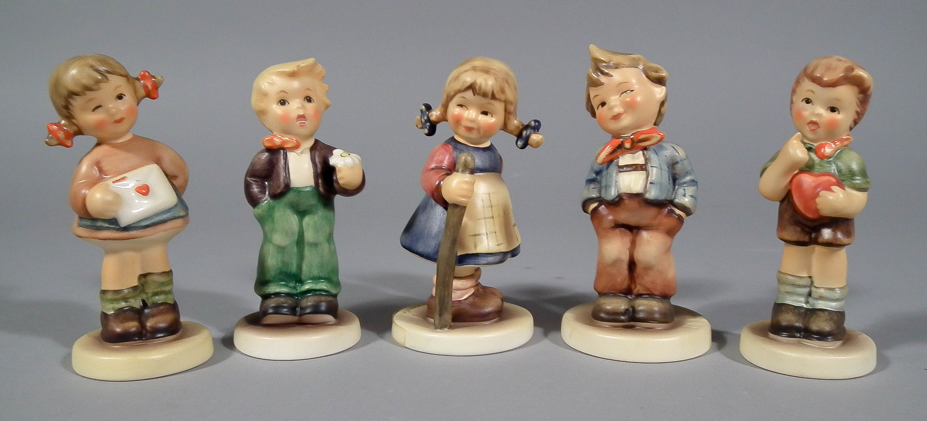 Five Hummel pottery - "A Flower for You", 3ins high, "Pixie", 3.5ins high, "Scamp",