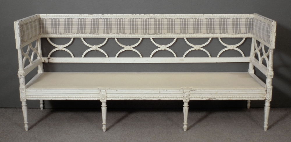 A Swedish white painted wood rectangular day bed, 81ins x 25ins x 37ins high (in poor condition)