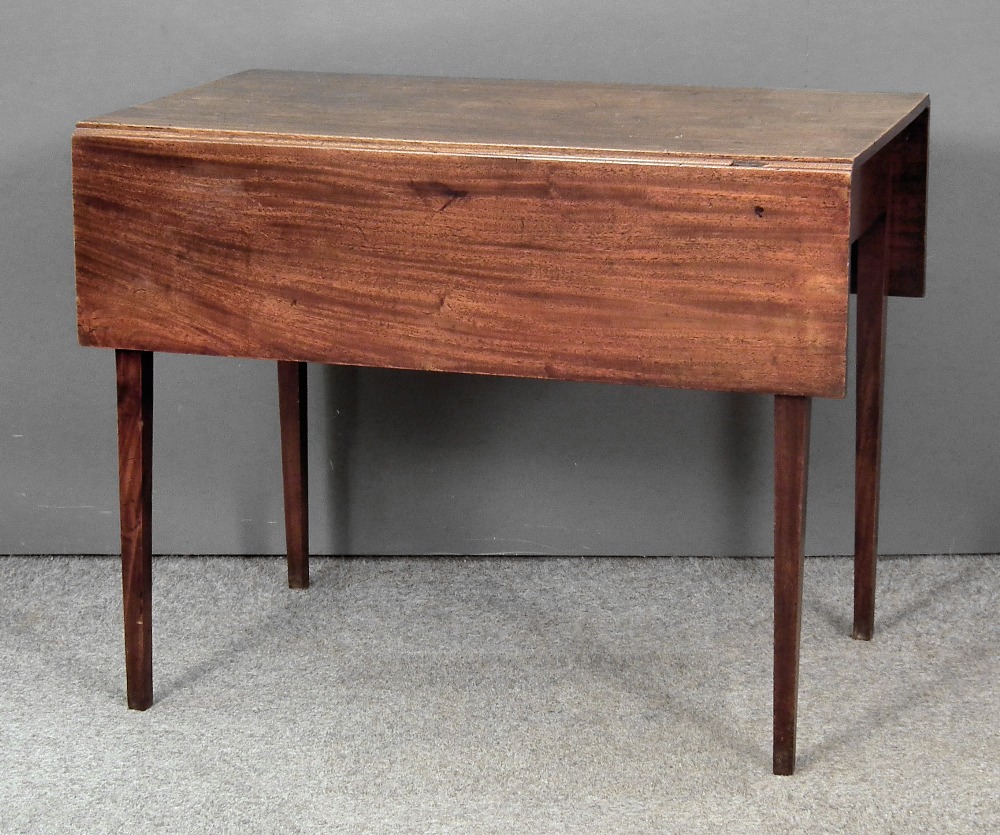 A George III mahogany Pembroke table fitted one drawer, on square tapered legs, 36ins x 42ins x