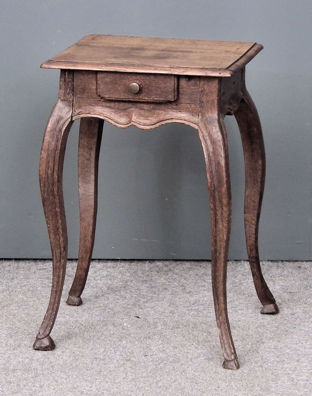 A French oak stand/lamp table, fitted one drawer, on cabriole legs, 14.5ins wide x 12ins deep x 22.