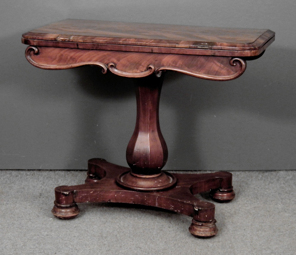A William IV figured mahogany rectangular card table, the baize lined folding top with bevelled edge