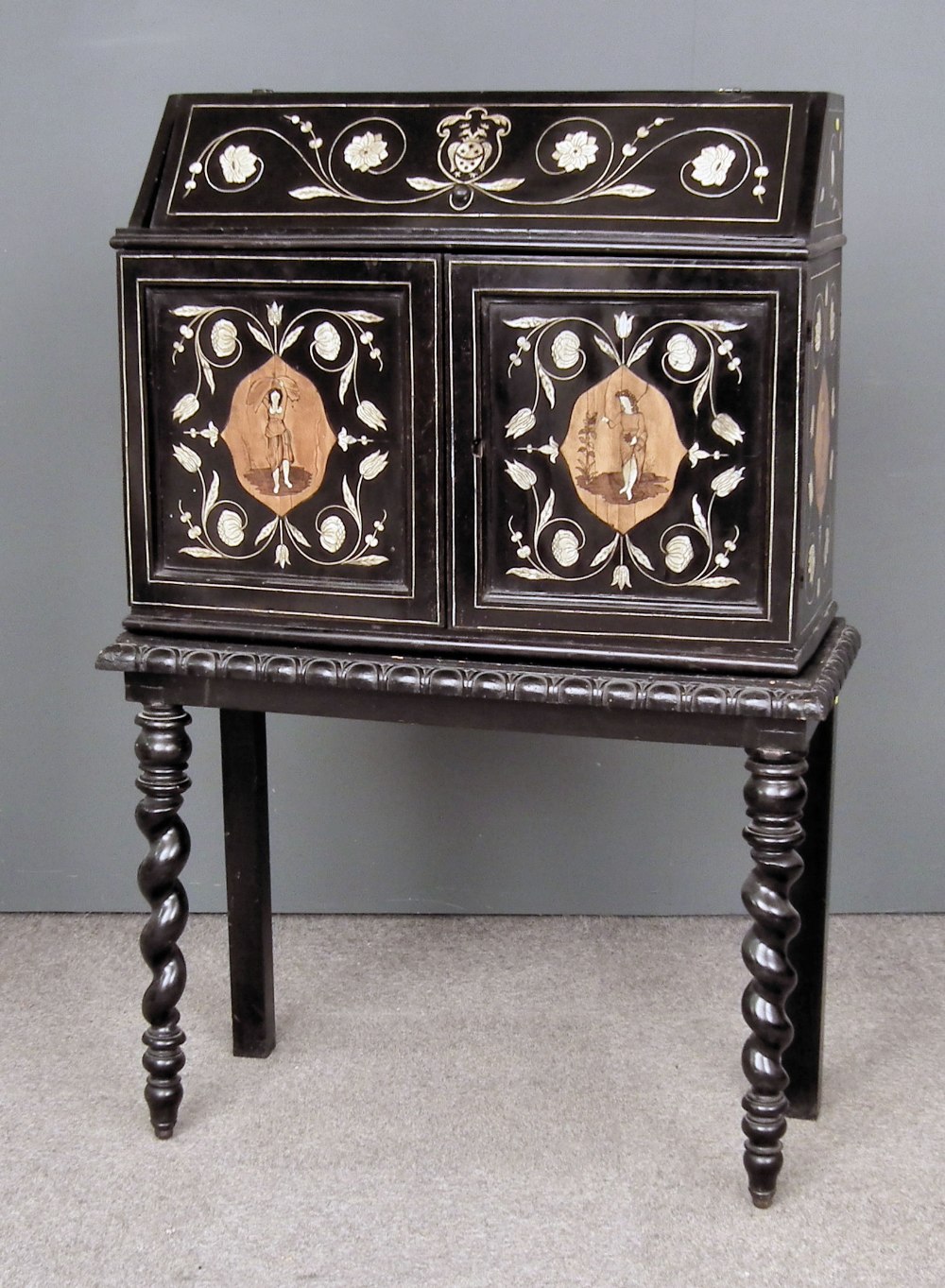 An unusual 19th Century Continental Collectors ebonised, marquetry and inlaid table cabinet on stand