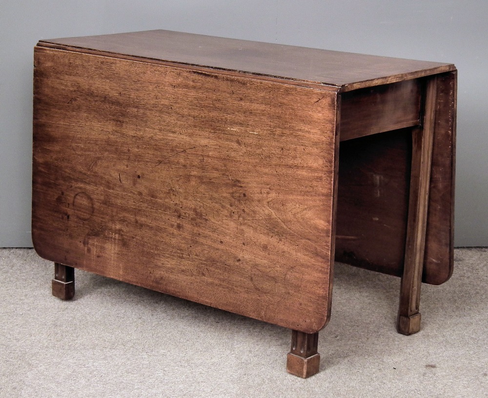 A George III mahogany rectangular dropleaf cottage dining table on moulded square legs, 41ins x 64.