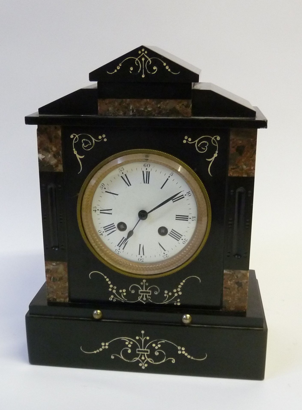 VICTORIAN DECORATED BLACK SLATE MANTEL CLOCK with French 8 days movement striking on a single bed,
