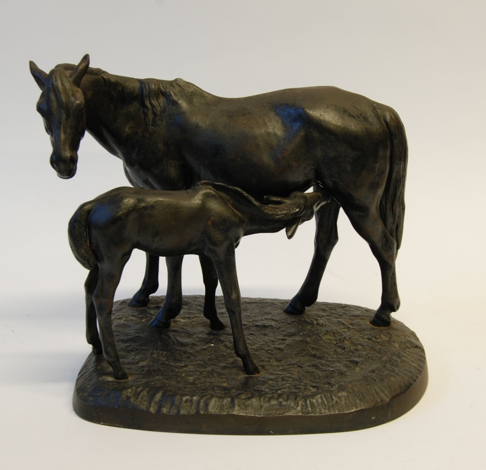 SPELTER GROUP OF A MARE AND FOAL, on shaped oblong base, faint impressed signature, 11 3/4" (29.9cm)