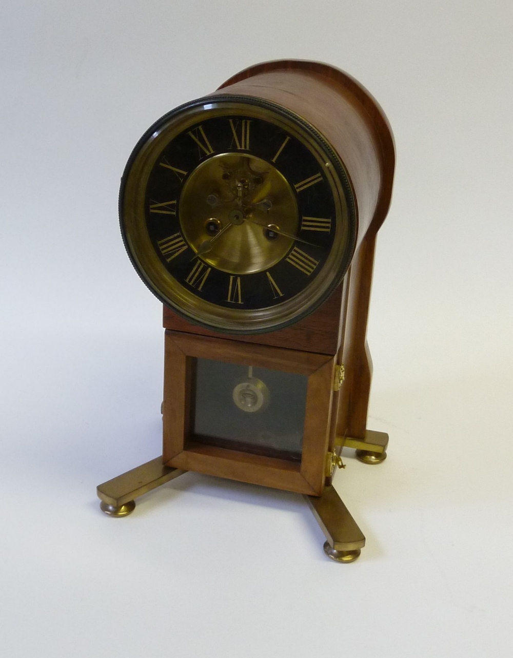 FRENCH DRUM CASED MANTEL CLOCK, with 8 days movement striking on a single bell, the brass dial