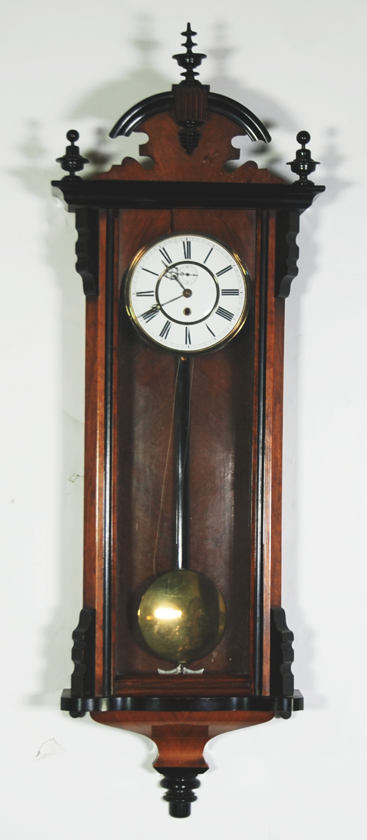 LATE 19th CENTURY VIENNA STYLE WALL CLOCK IN A WALNUT AND PARTLY EBONISED CASE, having a single