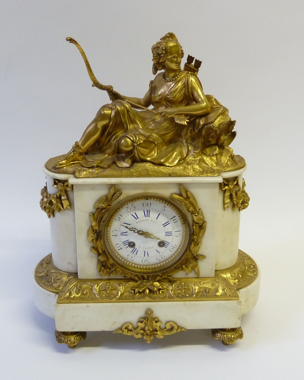 RAINGO FRÈRES A PARIS WHITE MARBLE AND GILT METAL MANTLE CLOCK, powered by an eight day movement,