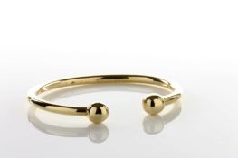 A Gentleman’s 15ct gold torque bracelet, with ball ends, weight 50 grams