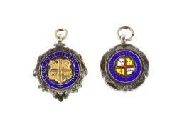 A silver 1928 Thornton Heath & District FL football pendant with enamelled decoration together