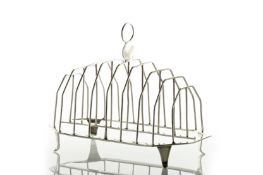 A George III silver eight division toast rack, hallmarked London 1792, with looped handle and fine