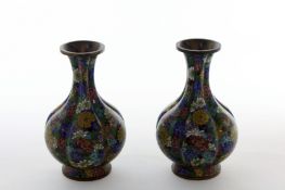 A pair of Japanese cloisonne enamel brass vases, of hexagonal lobed form with flared necks,