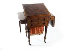 A Victorian rosewood work table, the hinged leather inset top rising to form a book stand, over
