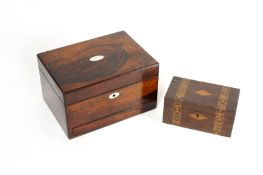 A Victorian rosewood dressing table box, opening to reveal compartmented interior with mother of