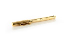A Mabie, Todd & Co Swan rolled gold fountain pen with engine turned decoration and 14ct gold nib,