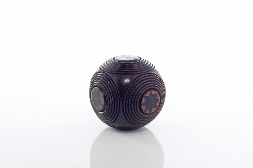 A Victorian Tunbridgeware carved rosewood coin holder, of circular form with removable coin tube,